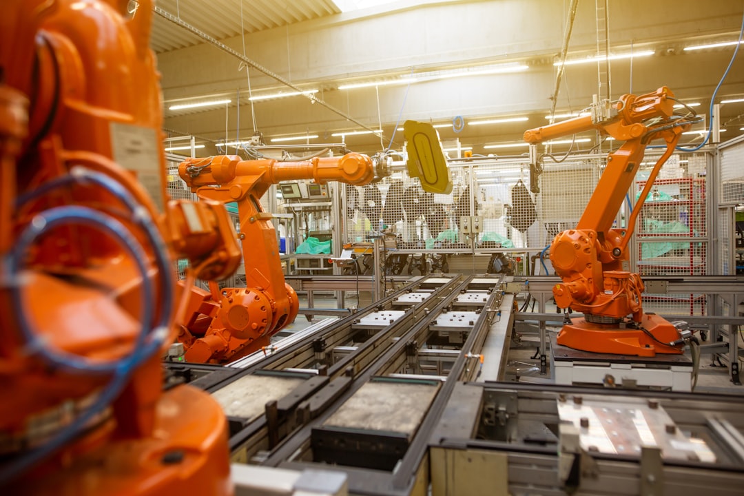 Services Automatic robots in the industrial factory for assembly automotive products, automotive concept
